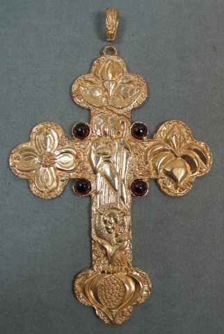 ROUGH GOLD CASTING WITH GARNET CABOCHONS