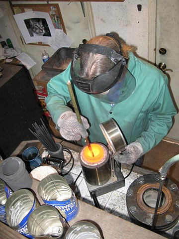 MELTING AND STIRRING THE GOLD