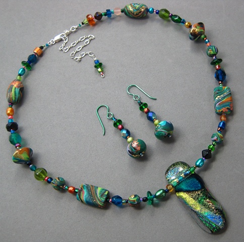 fused dichroic glass blue green pendant on polymer clay beaded necklace Nancy Denmark