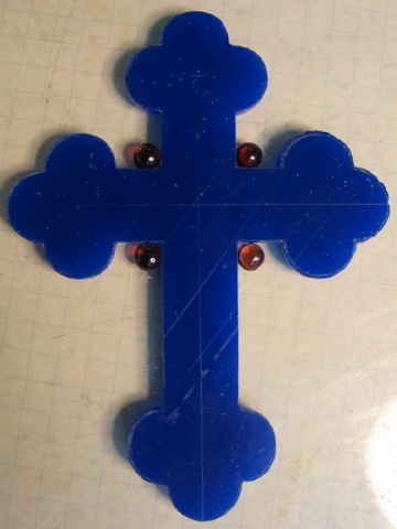 WAX MODEL WITH GARNET CABOCHONS