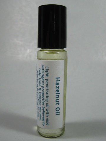 hazelnut moisturizing oil in rollet bottle