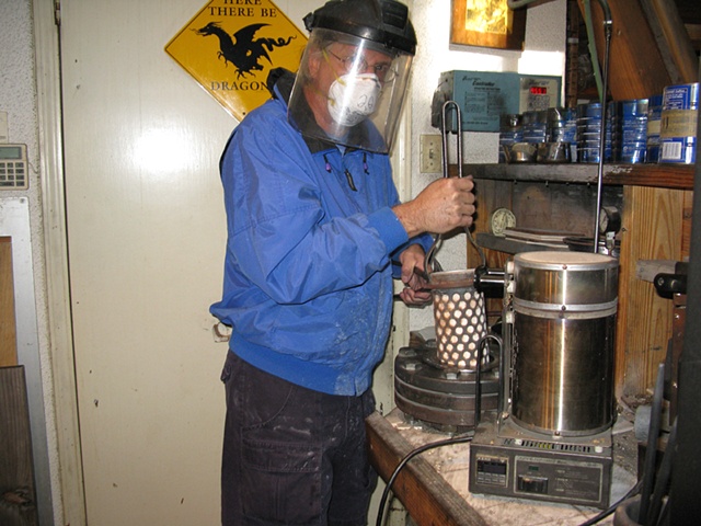 FLASK BEING REMOVED AFTER CASTING