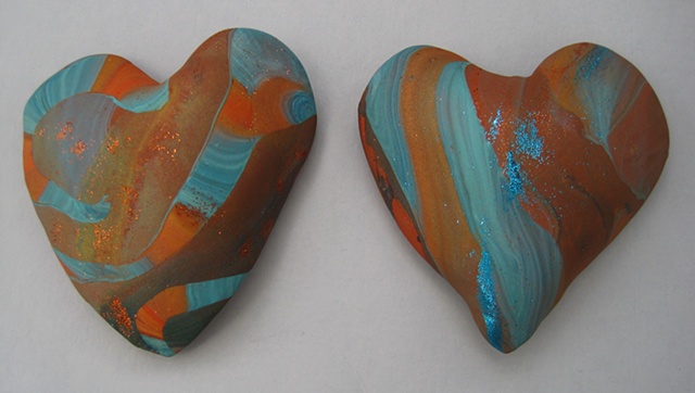 2 BROWN HAND HEARTS
