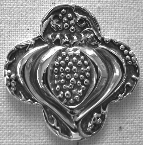 sterling silver quatrefoil pendant with pomegranate design by Nancy Denmark