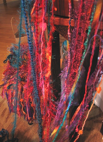 YARN VARIETY FLOWING FROM BASKET