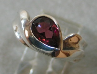 PEAR SHAPE RHODOLITE GARNET IN STERLING RING