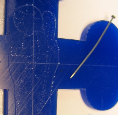 PINHOLES IN WAX