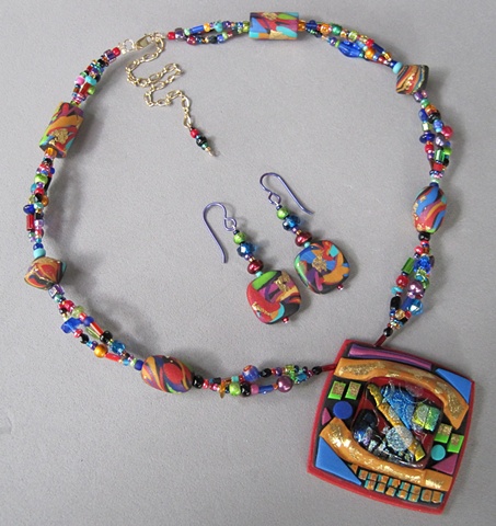 fused glass and polymer clay pendant on beaded necklace