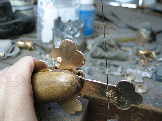 CLOSE UP OF SAWING