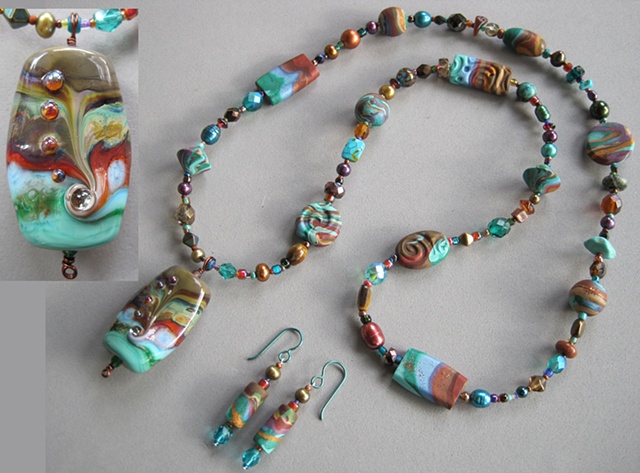 lampwork glass pendant with polymer clay beaded necklace
