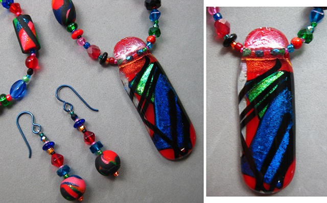 fused glass pendant strung into a beaded necklace set by Nancy Denmark