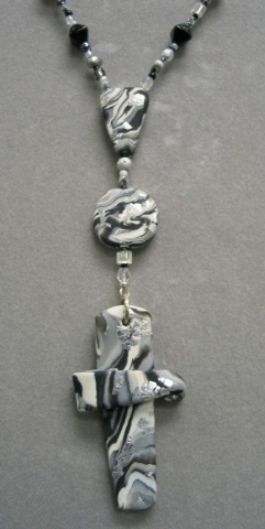 BLACK, WHITE, SILVER PRAYER BEADS CLOSE UP