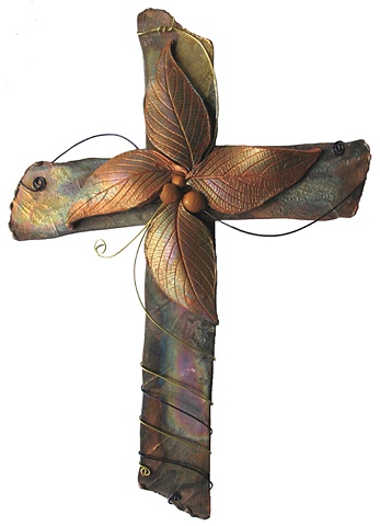 CROSS OF SWIRLING LEAVES