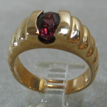 OVAL RHODOLITE GARNET IN 14K RING