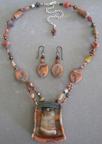  beaded necklace set with pendant of condor agate in polymer clay frame