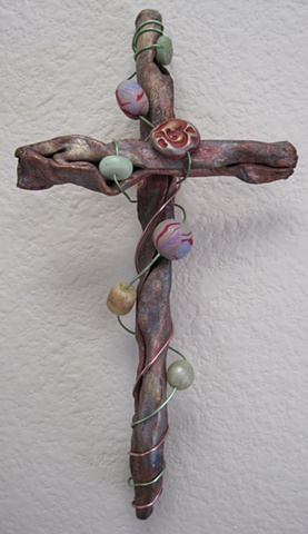 copper wall cross embellished with polymer clay beads and wire