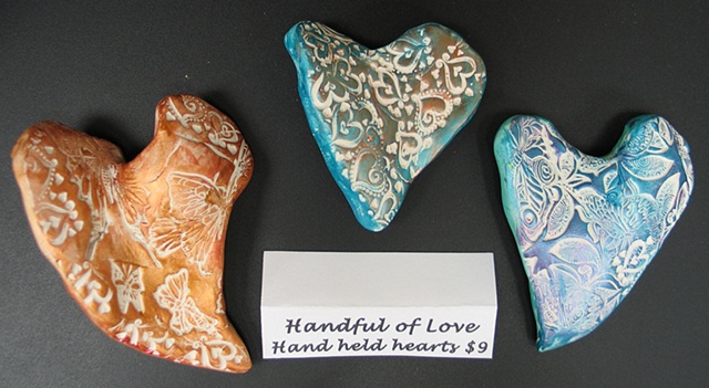 3 HAND HELD HEARTS
"a handful of love"