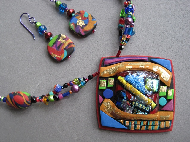 polymer clay and fused glass pendant on beaded necklace