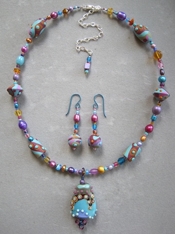 lampwork bead pendant on beaded necklace