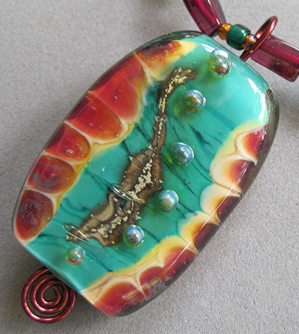 lampwork pendant on beaded necklace