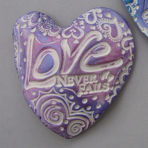LAVENDER LOVE NEVER FAILS HAND HEART