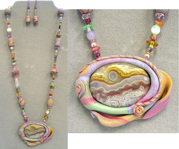 agate gemstone pendant feature in a polymer clay frame