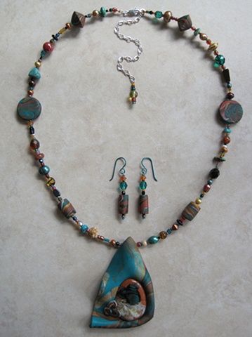 beads with polymer clay and glass pendant