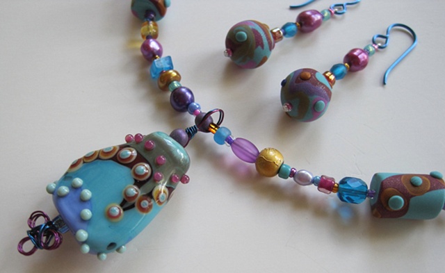 beaded necklace with lampwork bead pendant