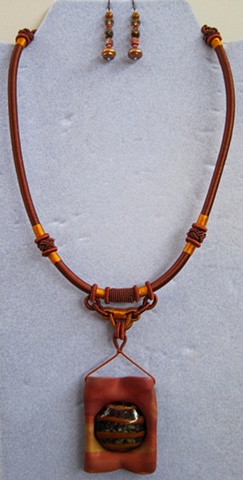 lampwork cab feature in polymer pendant on cord