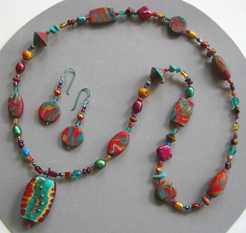 beaded necklace with lampwork bead pendant