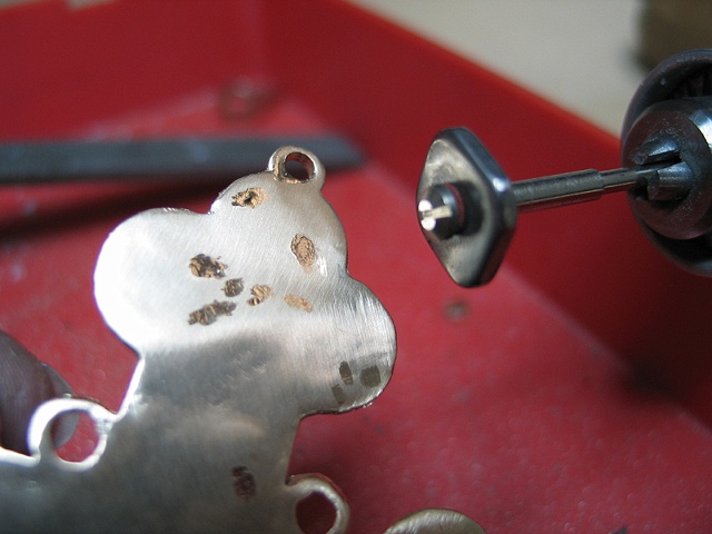 ANOTHER BURNISHING TOOL TO CLOSE PITS