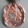 
POLYMER PENDANT WITH ROSETTA STONE ON CORD
2 Close Up Views
