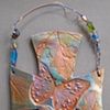 BUTTERFLY W/ GRAPEVINE IMPRESSIONS SOLD