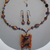 GOLD STRIKE
BEADED NECKPIECE