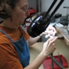 WORKING UNDER MAGNIFYING LAMP