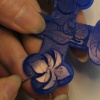 SCRAPING TREFOIL BASE AROUND THE LILY