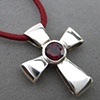 H23 GIFT OF GOD CROSS W/ FACETED GARNET