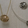 SUN FACES GOLD AND SILVER