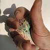 A CROSS IN CLOSING HAND