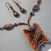 GOLD STRIKE
PENDANT W/ EARRINGS VIEW
