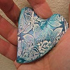 HEART NESTLED IN OPEN HAND