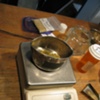 GOLD BEING WEIGHED FOR CASTING