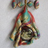 POLYMER PENDANT W/ GLASS CAB ON CORD CLOSE UP