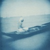 alone in his canoe