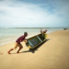 2 guys rolling canoe