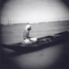 man in canoe