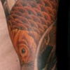 Koi fish sleeve with lotus flowers and hannya mask.