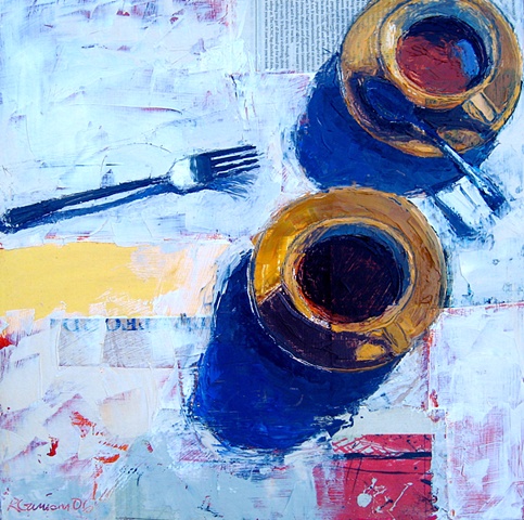 Two yellow cups with fork
