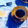 Two yellow cups with fork