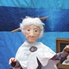 Heather Jarry performing with marionettes